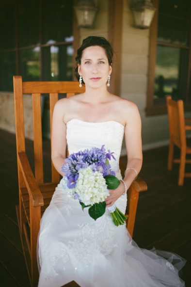 Bride sitting in rocking chair