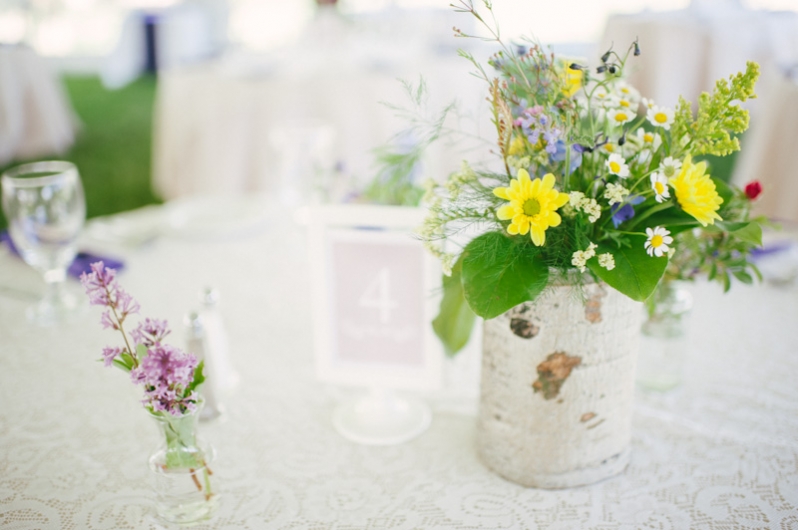 Wildflowers on tables at Colorado wedding 